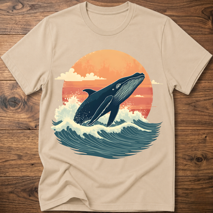 Sand-colored whale graphic t-shirt with ocean waves and sunset circle print