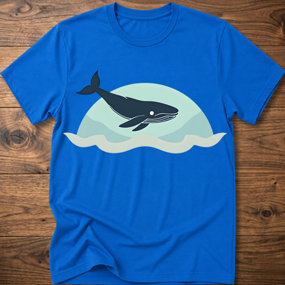 Royal blue crew-neck t-shirt with dark whale graphic over teal waves design