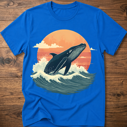 Royal blue whale graphic t-shirt with ocean waves and sunset circle print