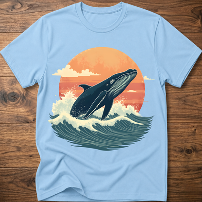 Light blue whale graphic t-shirt with ocean waves and sunset circle print
