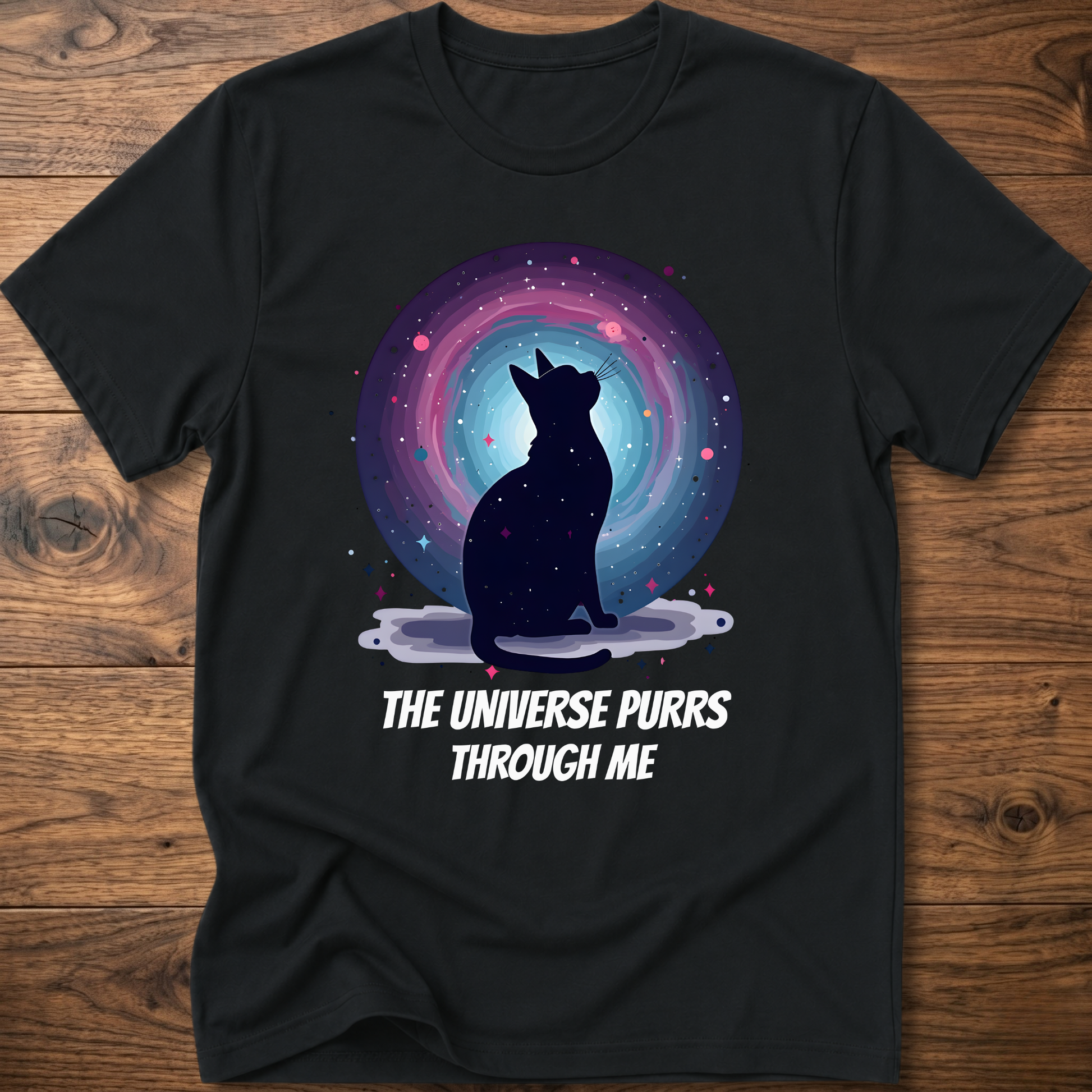 Black cat t-shirt with cosmic circle and purple "The universe purrs through me" text