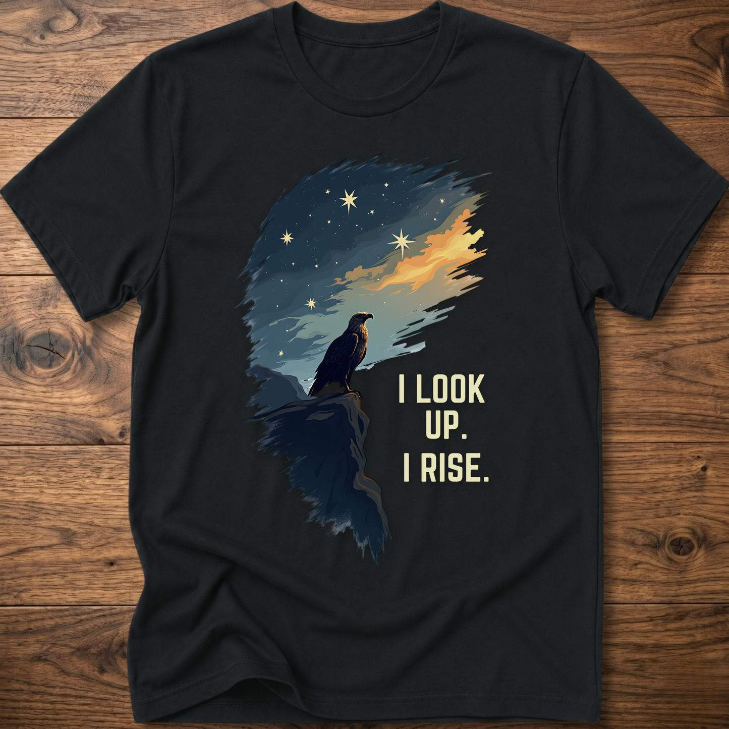 Black T-shirt with raven sunrise graphic and 'I LOOK UP. I RISE.'