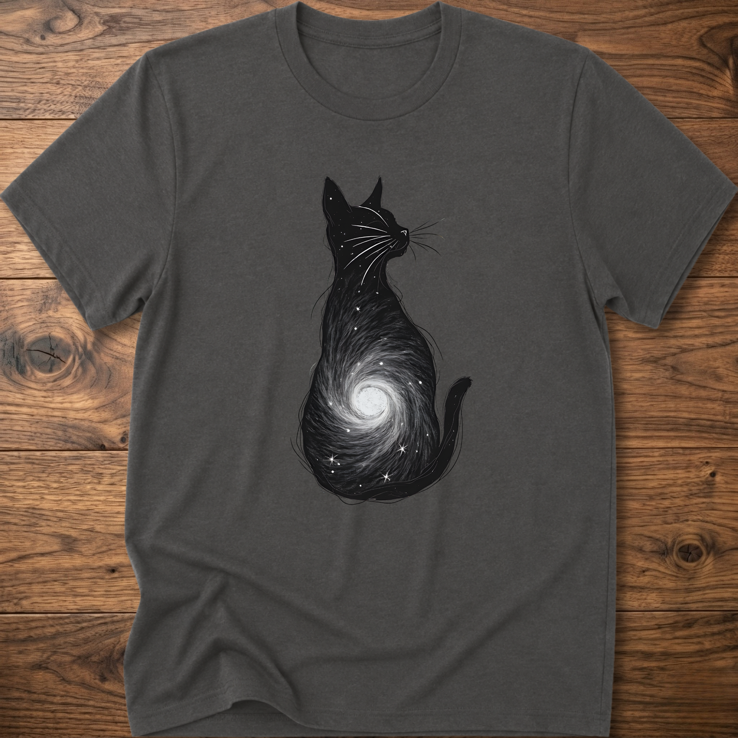 Charcoal cat graphic t-shirt with black outline and spiral galaxy design on front