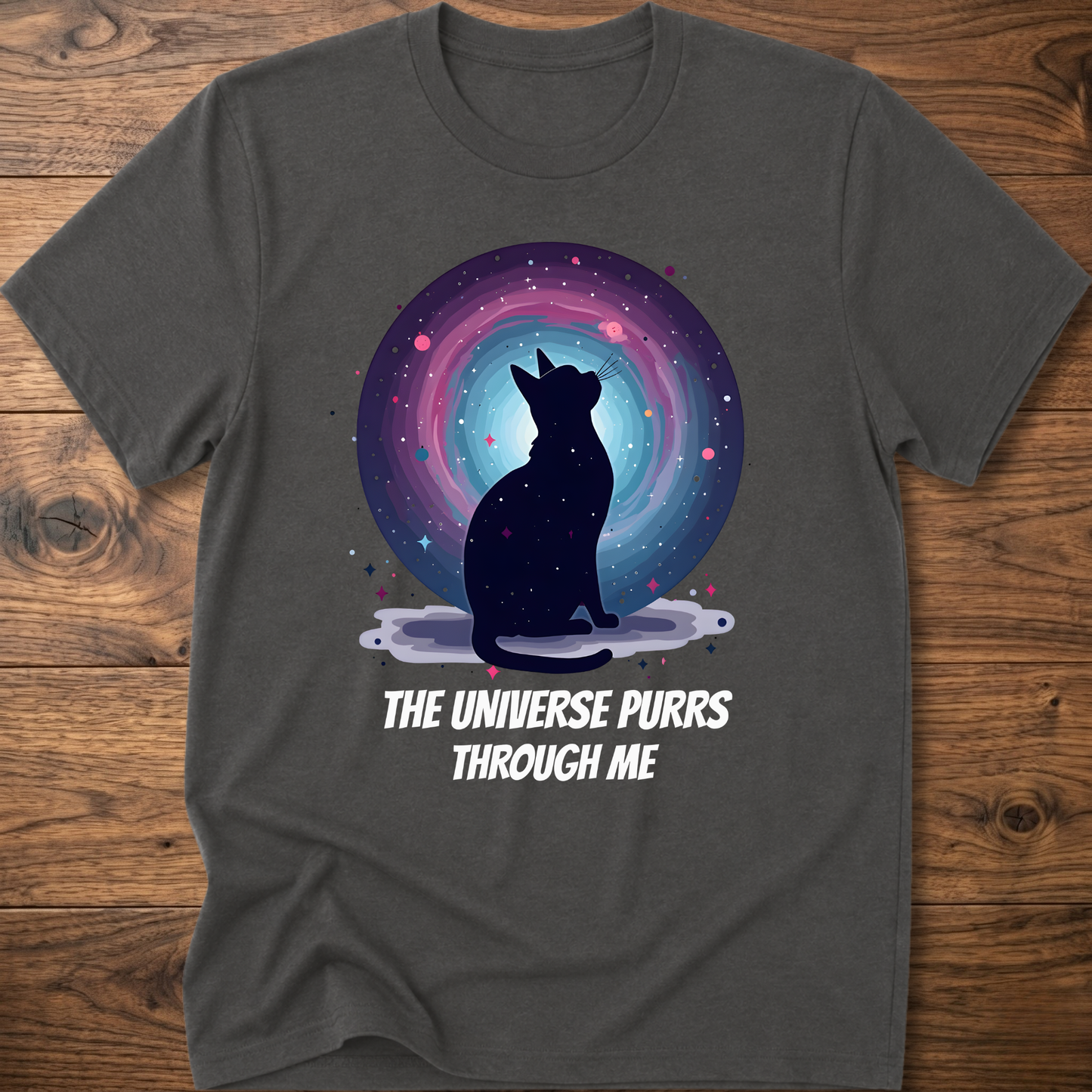 Heather gray cat t-shirt with cosmic cat silhouette and purple "The universe purrs through me" text