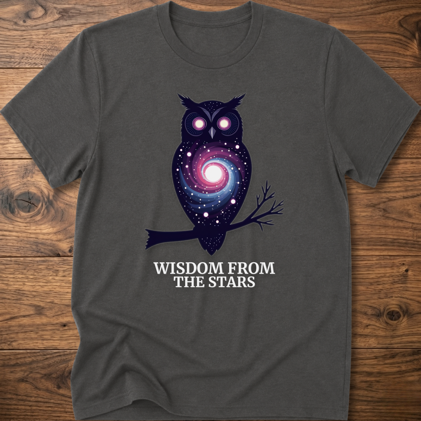 Dark heather gray owl graphic t-shirt with glowing eyes and “Wisdom from the Stars”