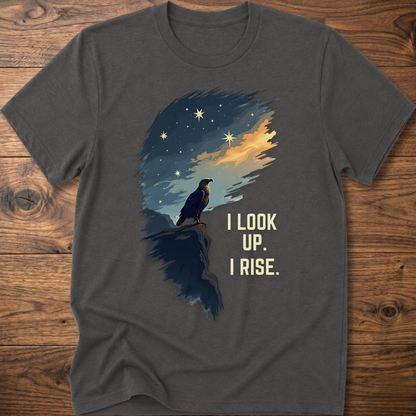 Charcoal T-shirt with raven sunrise graphic and 'I LOOK UP. I RISE.'