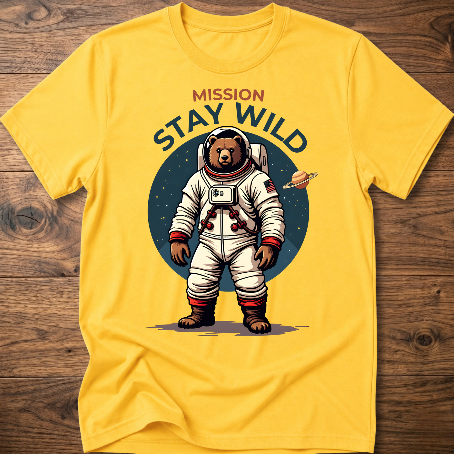 Yellow crew-neck T-shirt with 'Mission Stay Wild' astronaut bear graphic