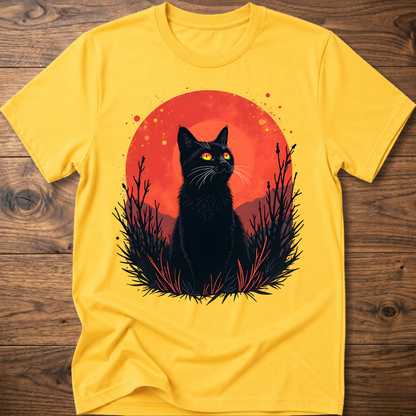 Yellow T-shirt with black cat graphic in red-orange halo and night-plant silhouettes