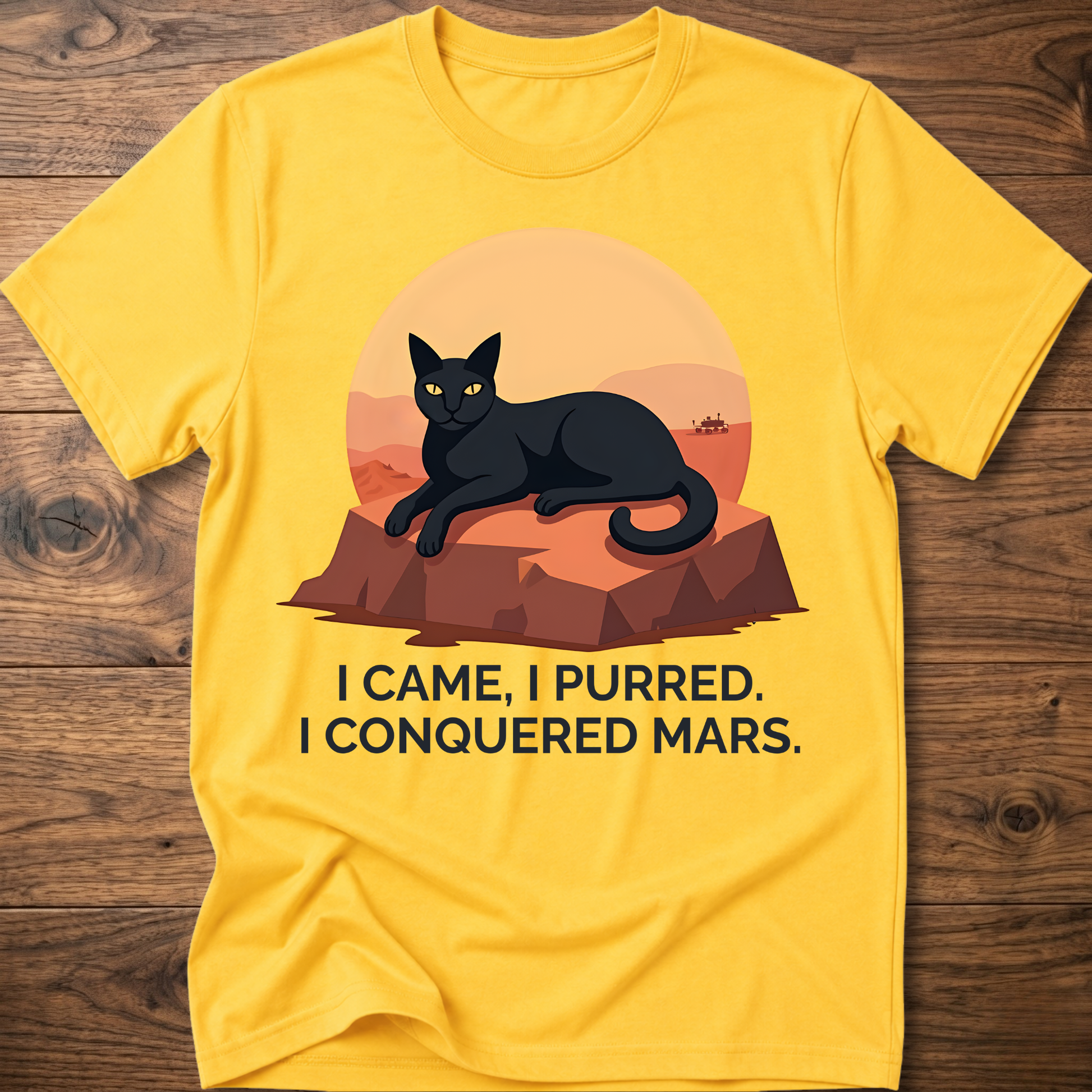Conquered Cat T-shirt, yellow; lounging cat graphic with orange text 'I CAME, I PURRED.'