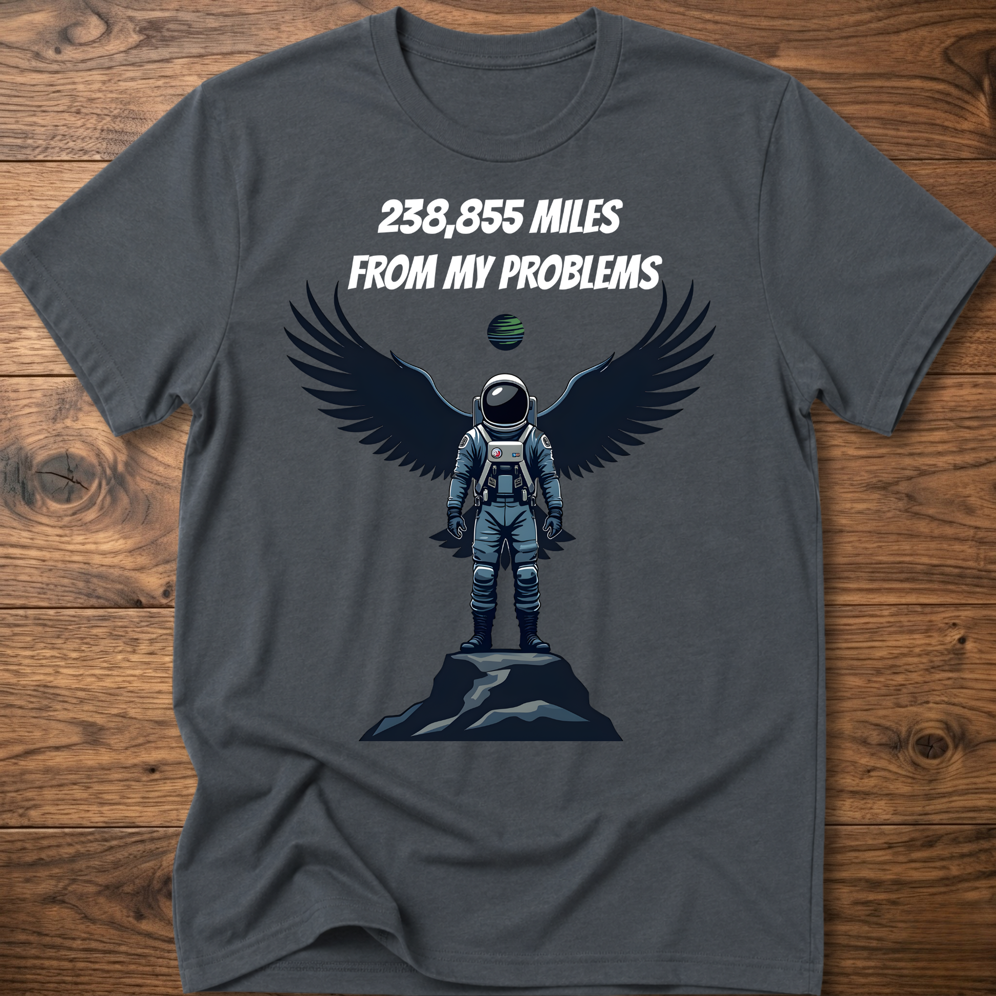 Dark heather crewneck t-shirt with astronaut-eagle graphic and text '238,855 Miles'.
