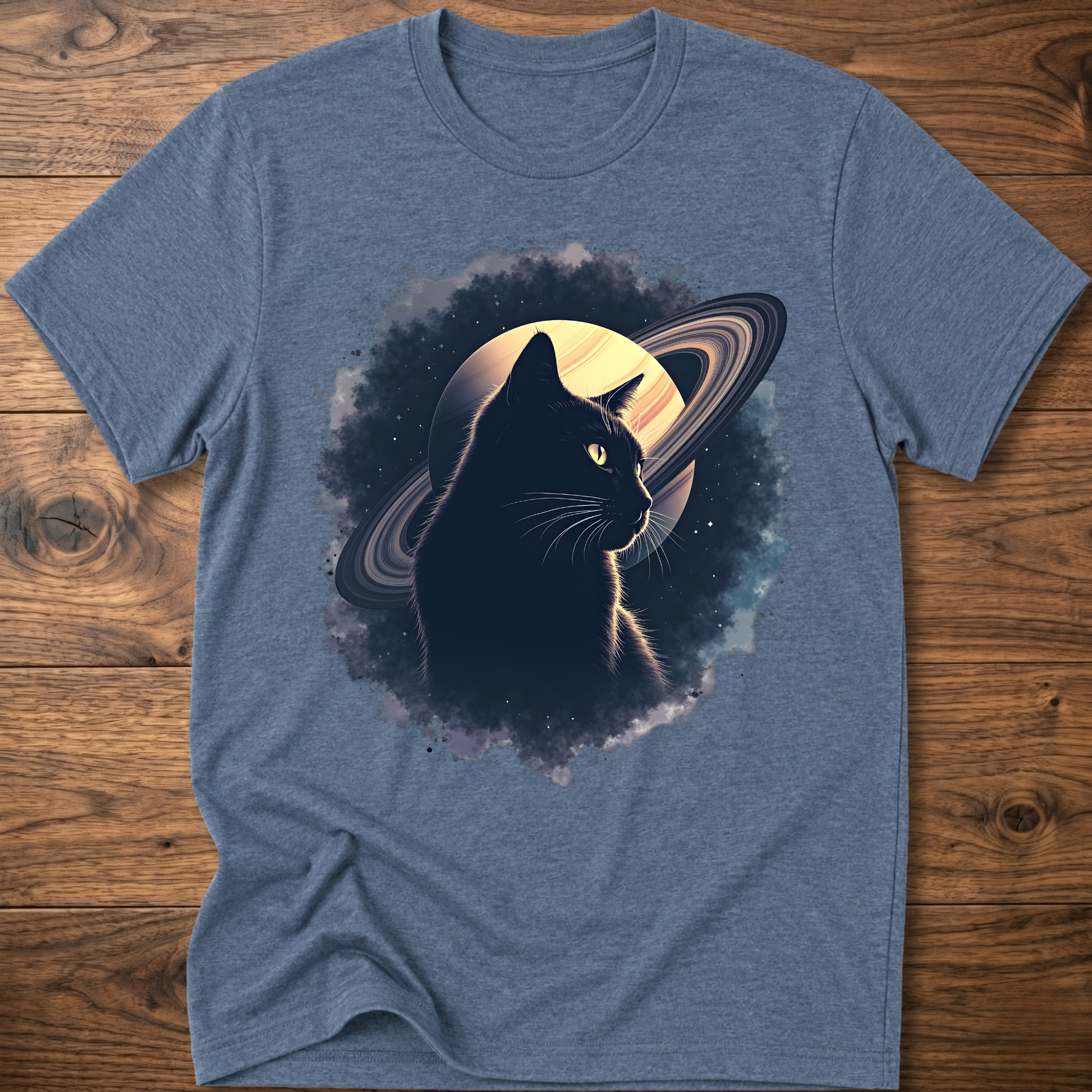 Heather blue cat graphic t-shirt with moon and swirl design, crew neck short sleeves