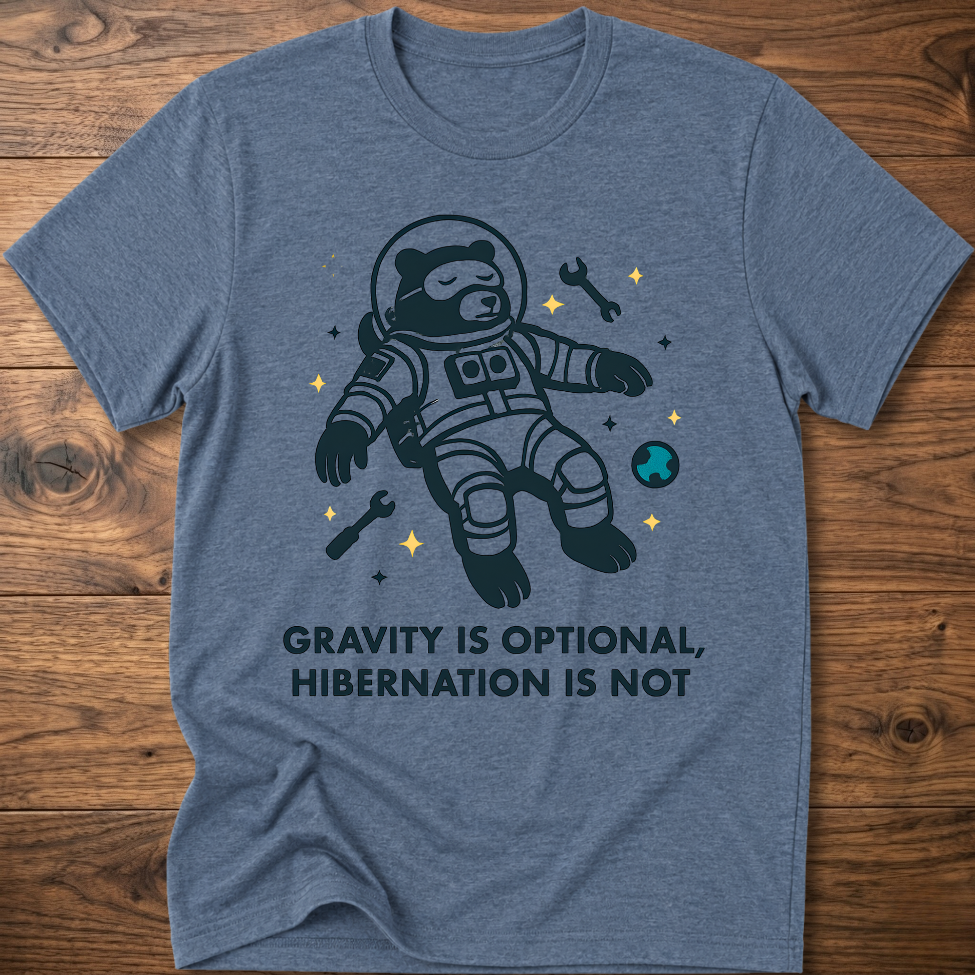 Hibernation bear astronaut t-shirt in heather blue with front astronaut graphic and slogan text