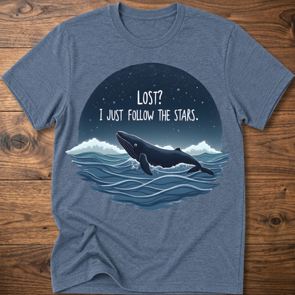 Heather blue whale graphic t-shirt with circular “LOST? I JUST FOLLOW THE STARS.” print