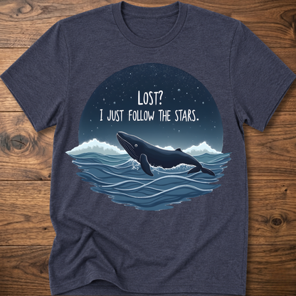 Dark gray whale graphic t-shirt with circular “LOST? I JUST FOLLOW THE STARS.” print