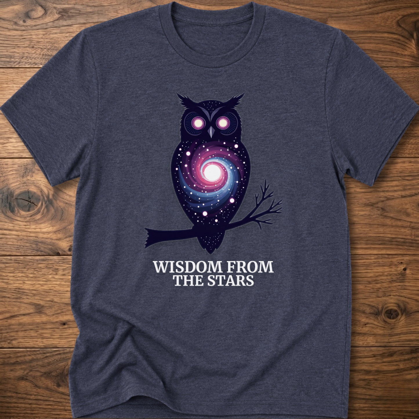 Charcoal gray owl graphic t-shirt with glowing eyes and “Wisdom from the Stars” text
