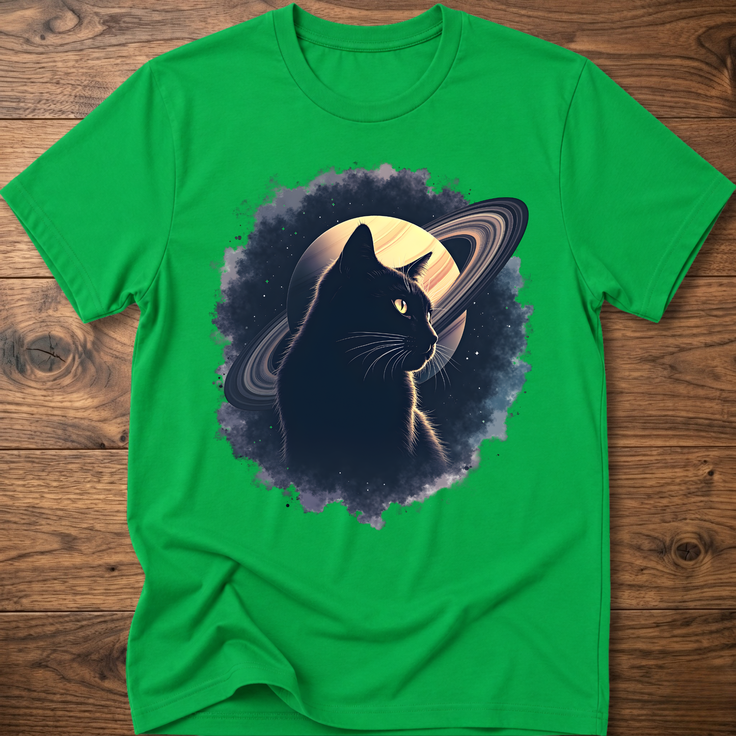 Green cat graphic t-shirt with moon and swirl design, crew neck short sleeves