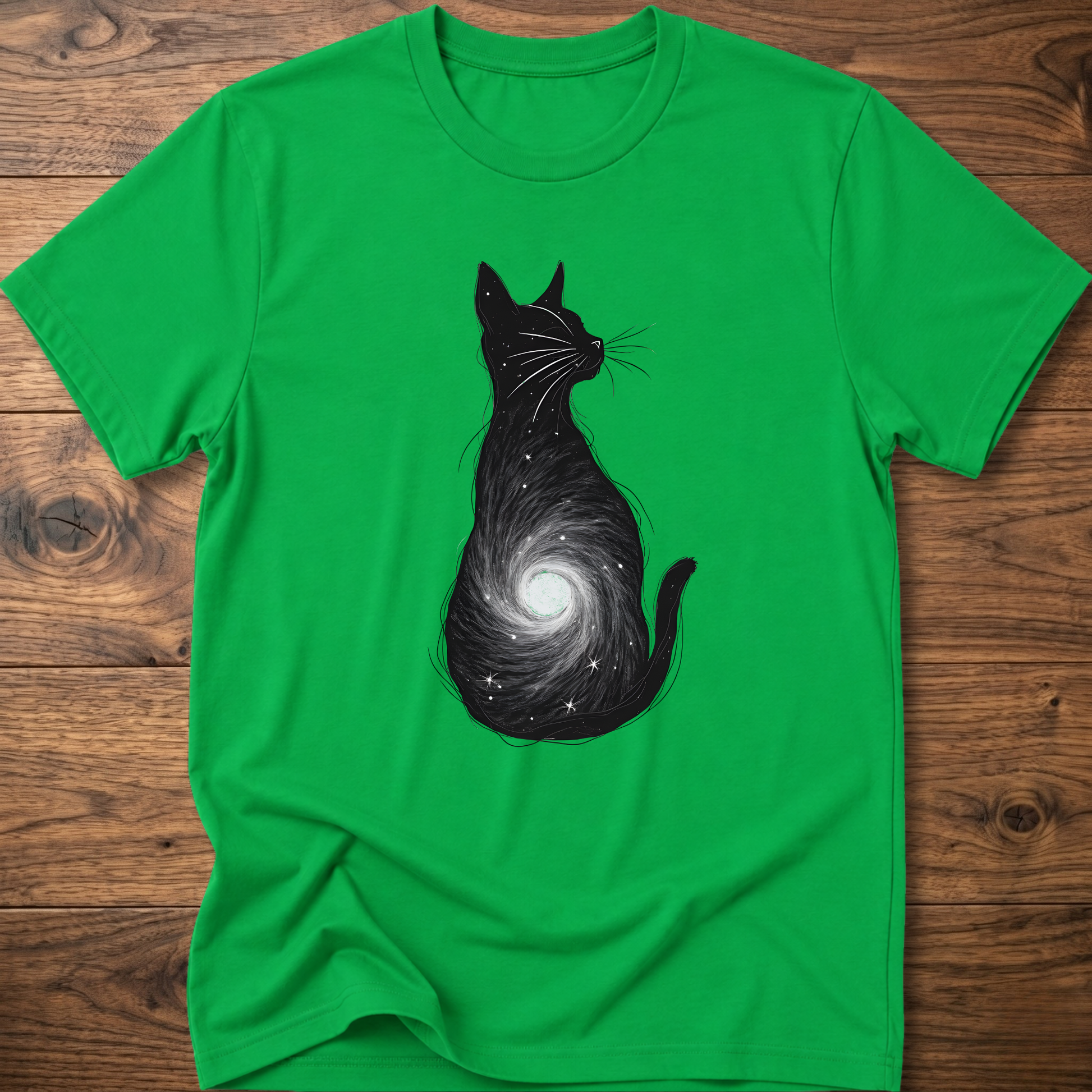 Green cat graphic t-shirt with black cat silhouette and spiral galaxy swirl on front