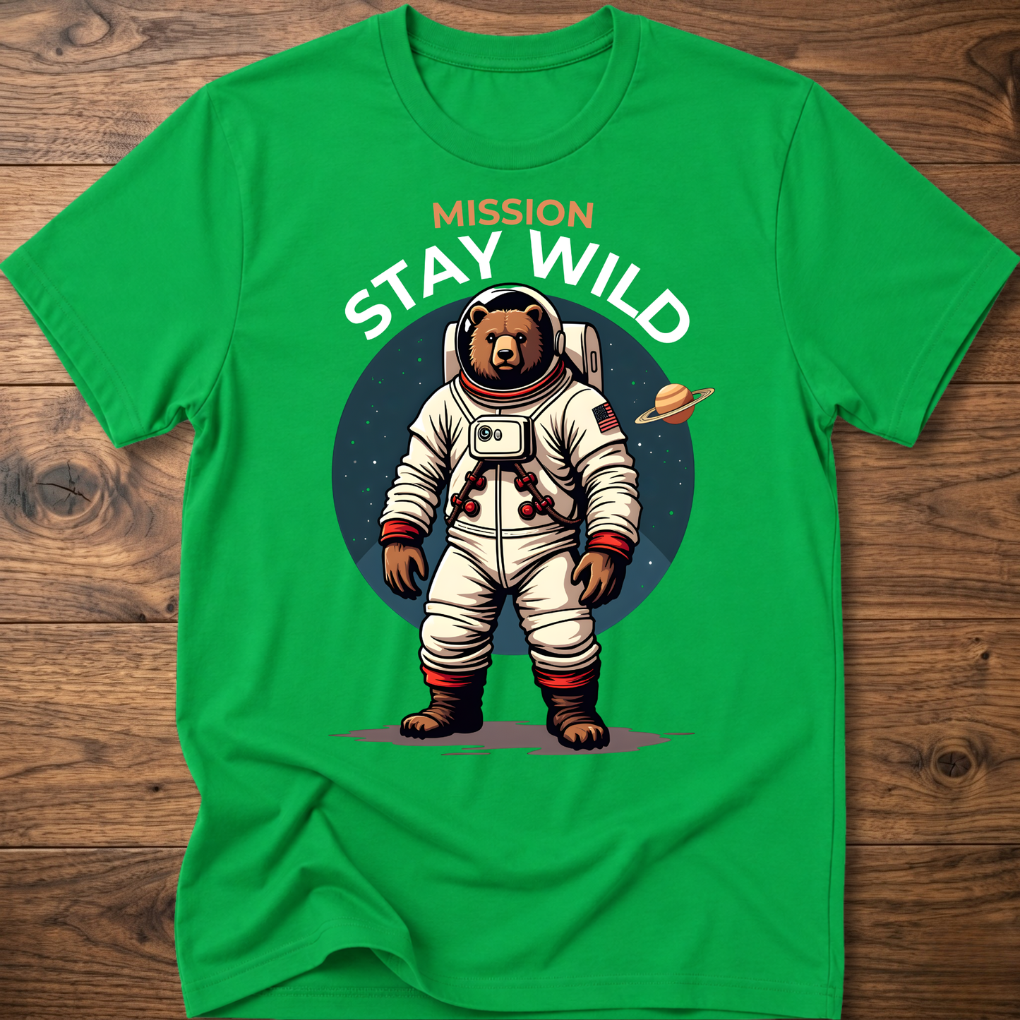 Green crew-neck T-shirt with 'Mission Stay Wild' astronaut bear graphic