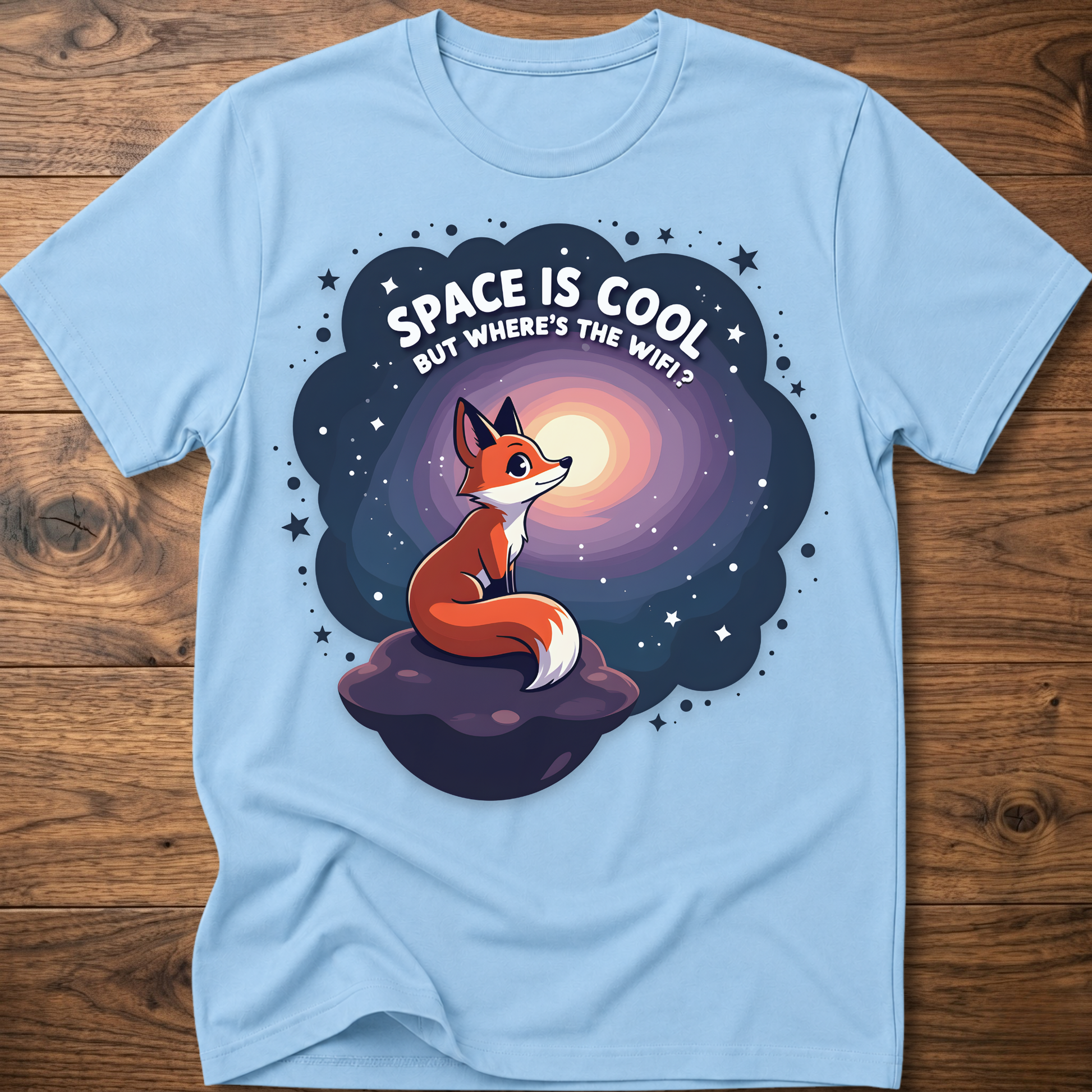 Light blue t-shirt with cartoon fox in space swirl graphic and “SPACE IS COOL” text