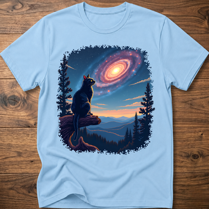 Light blue cat galaxy t-shirt with standing cat, spiral nebula, pine trees