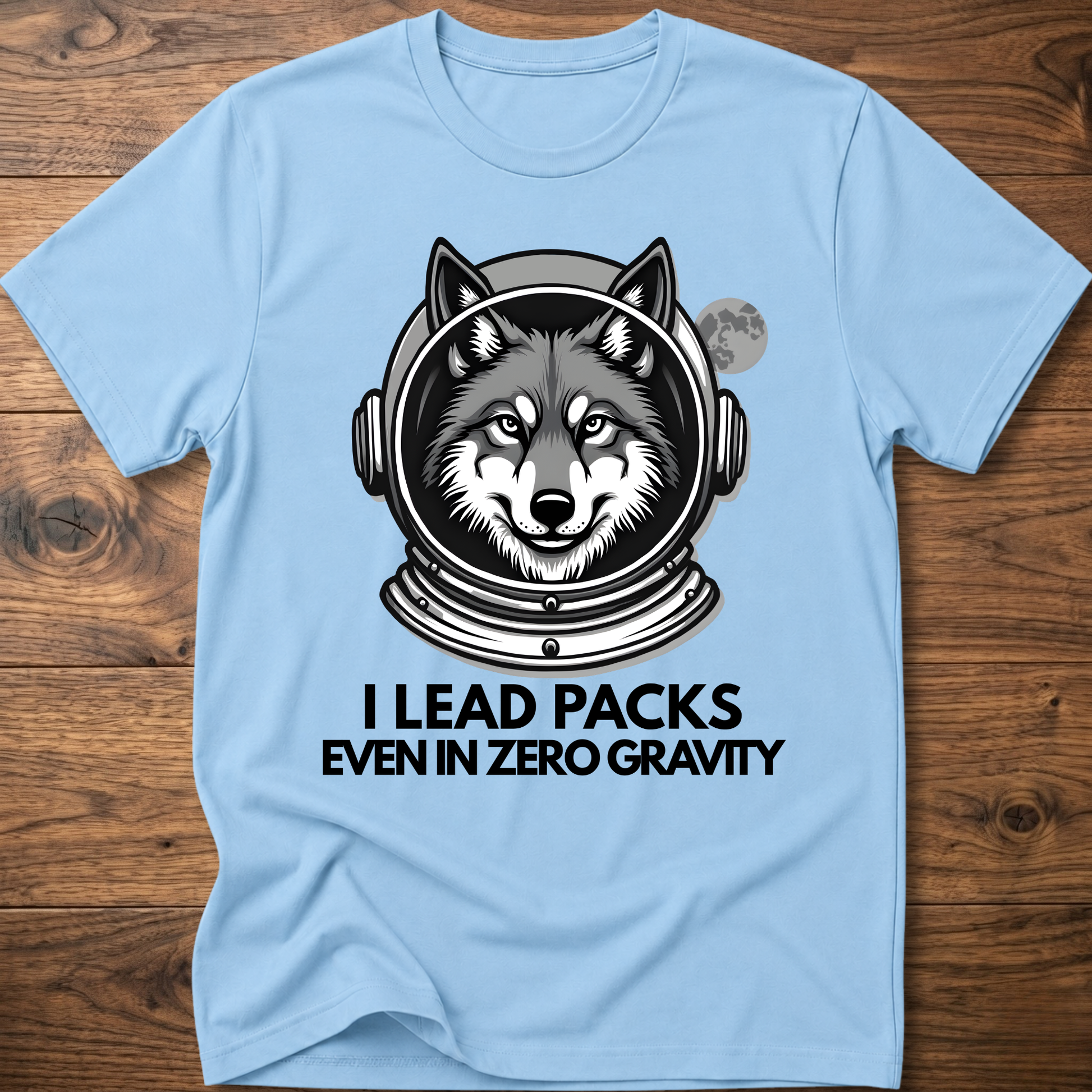 Light blue T-shirt with husky astronaut graphic and "I Lead Packs Even in Zero Gravity" text