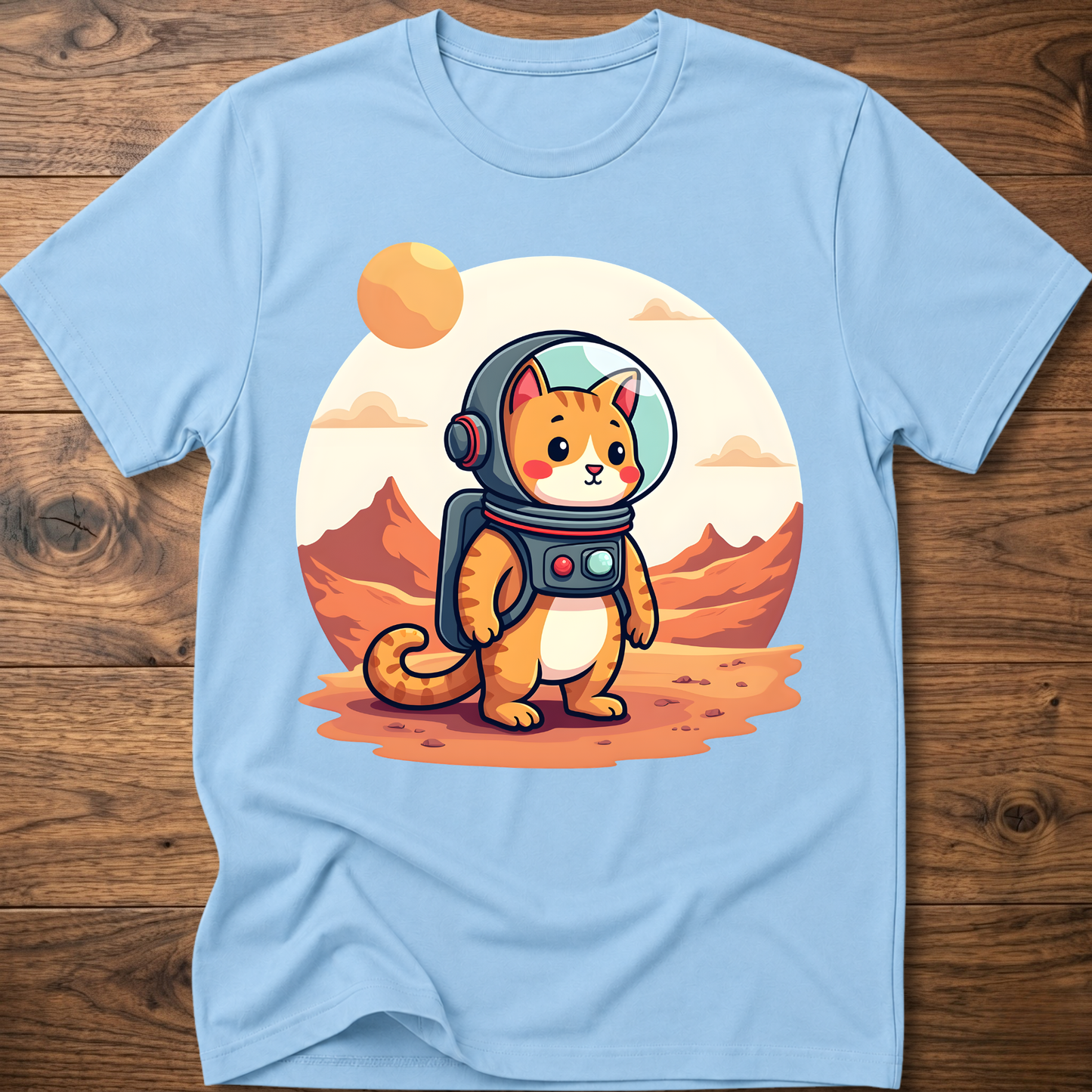 Light blue crew-neck T-shirt with astronaut cat graphic in the center