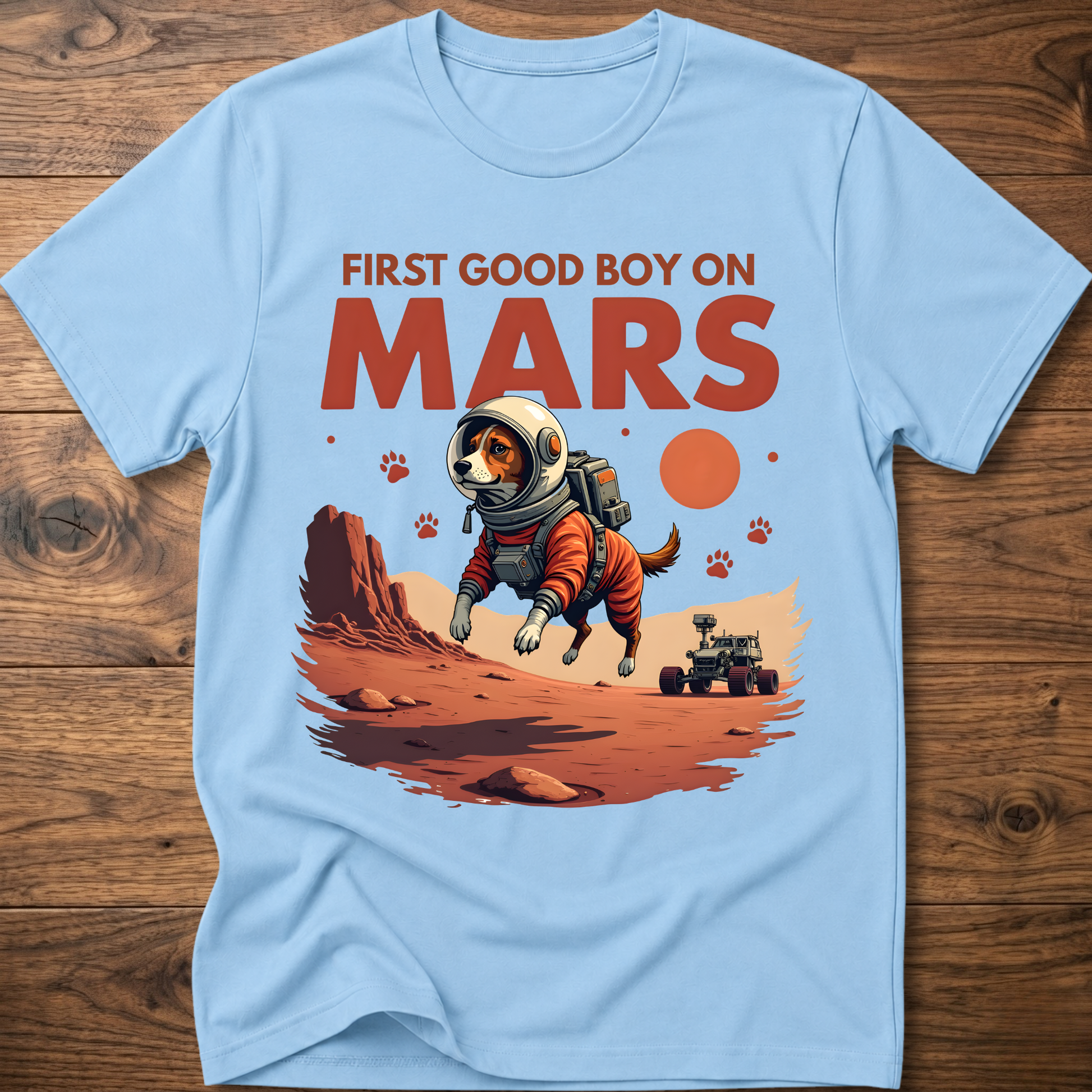 Light blue crewneck t-shirt with astronaut dog and 'First Good Boy on Mars' graphic