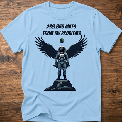 Light blue crewneck t-shirt with astronaut-eagle graphic and text '238,855 Miles'.