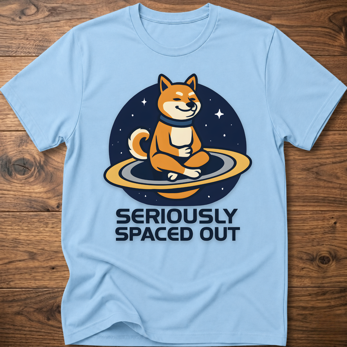 Light blue dog astronaut graphic t-shirt with "SERIOUSLY SPACED OUT" text