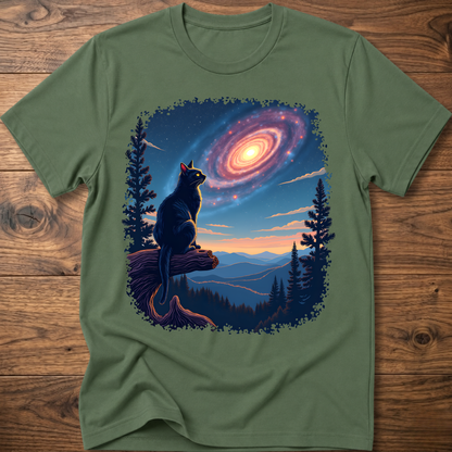 Olive green cat galaxy t-shirt with standing cat, spiral nebula, pine trees