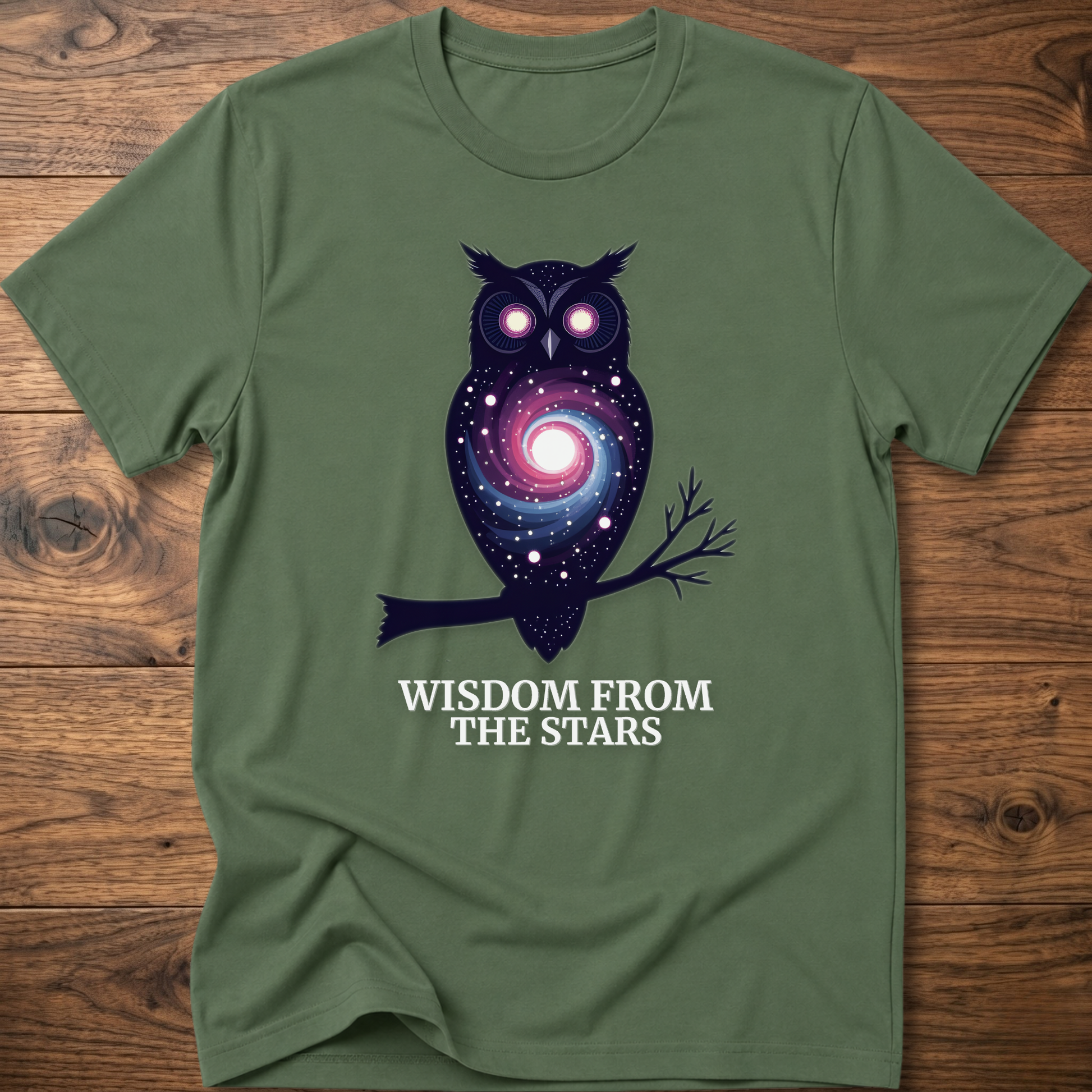 Olive green t-shirt with owl nebula graphic and “Wisdom from the Stars” text