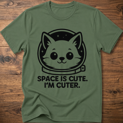 Olive green T-shirt with space cat face graphic and text "SPACE IS CUTE. I'M CUTER."