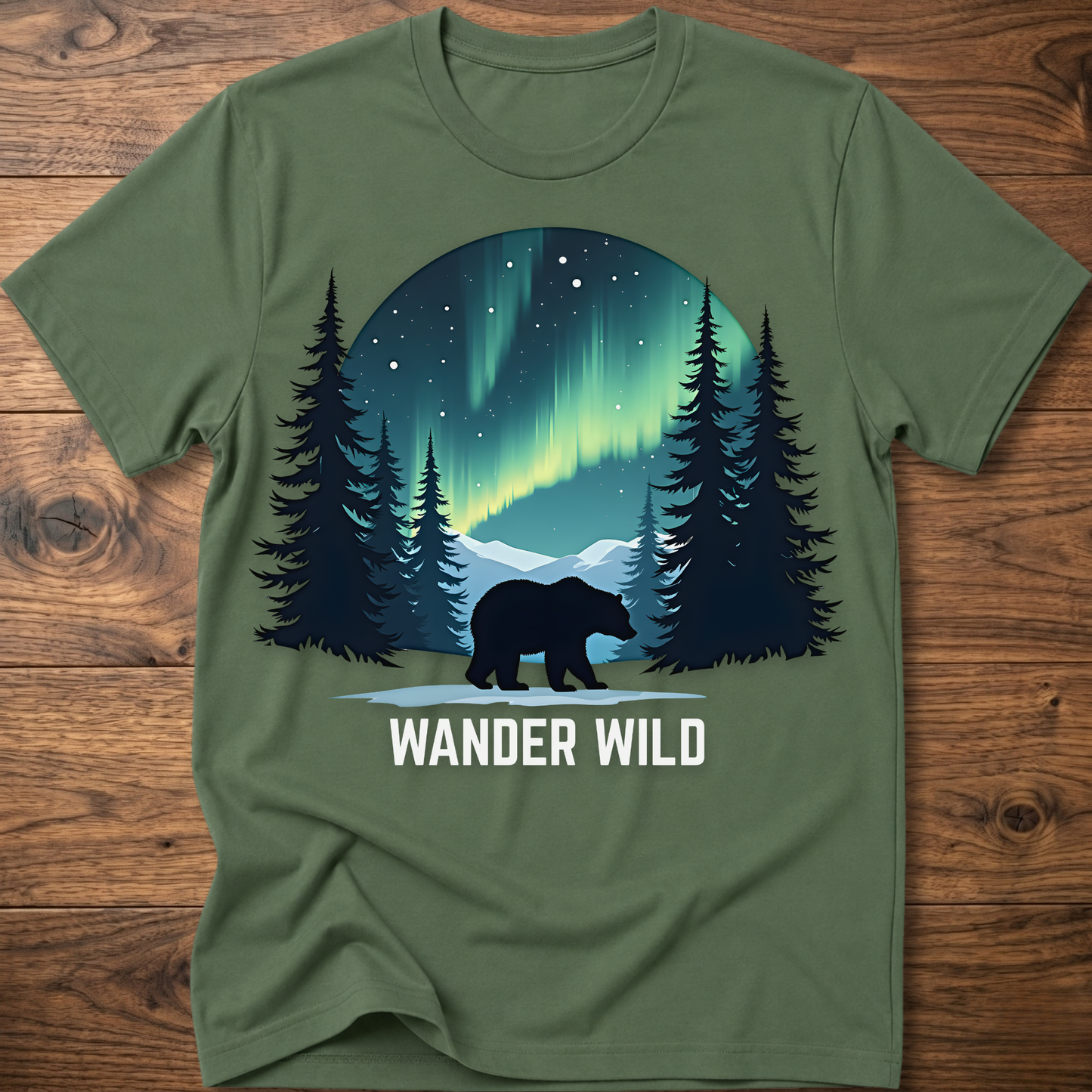 Olive crew-neck t-shirt with bear in forest graphic and 'Wander Wild' text