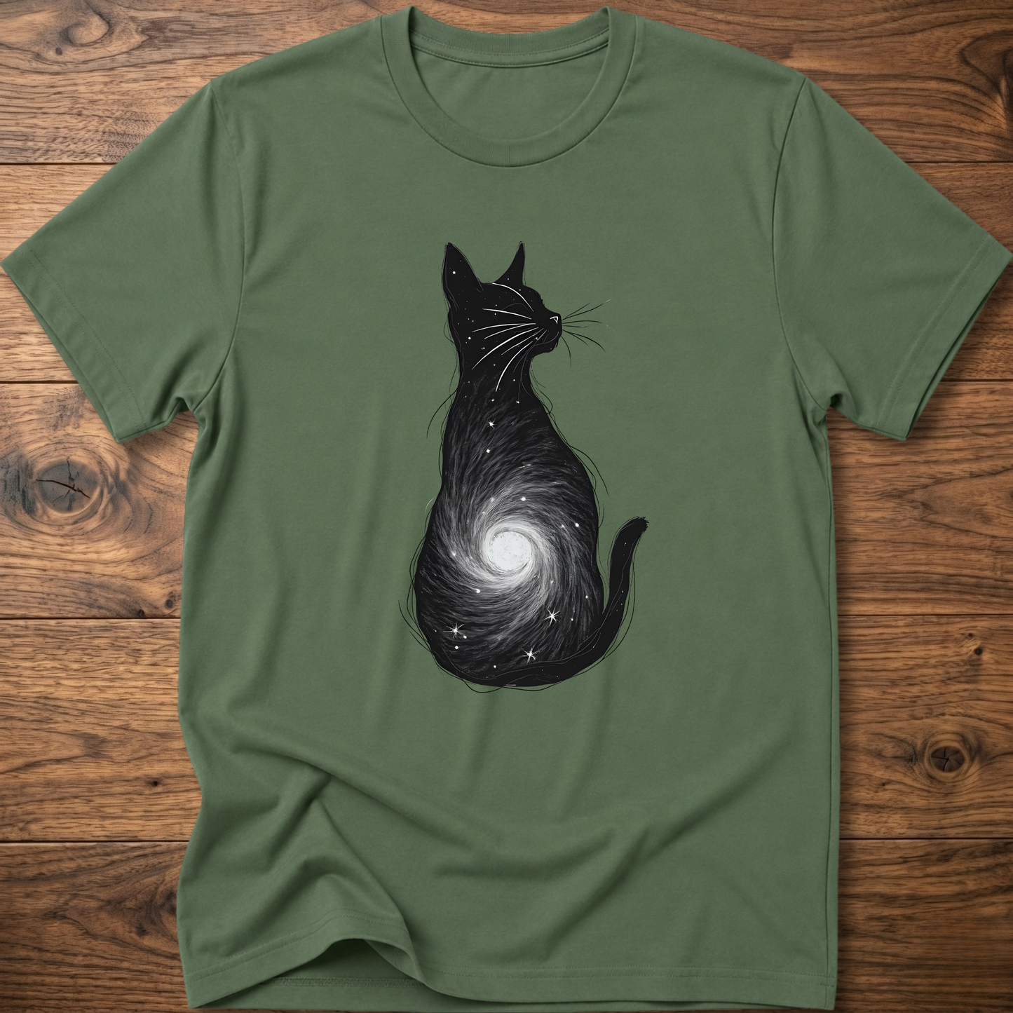 Olive green cat graphic t-shirt featuring a black cat with spiral galaxy swirl