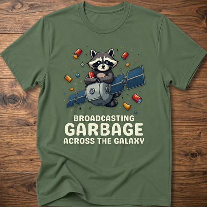 Olive green crew-neck T-shirt with raccoon holding megaphone graphic and “Broadcasting Garbage” text.