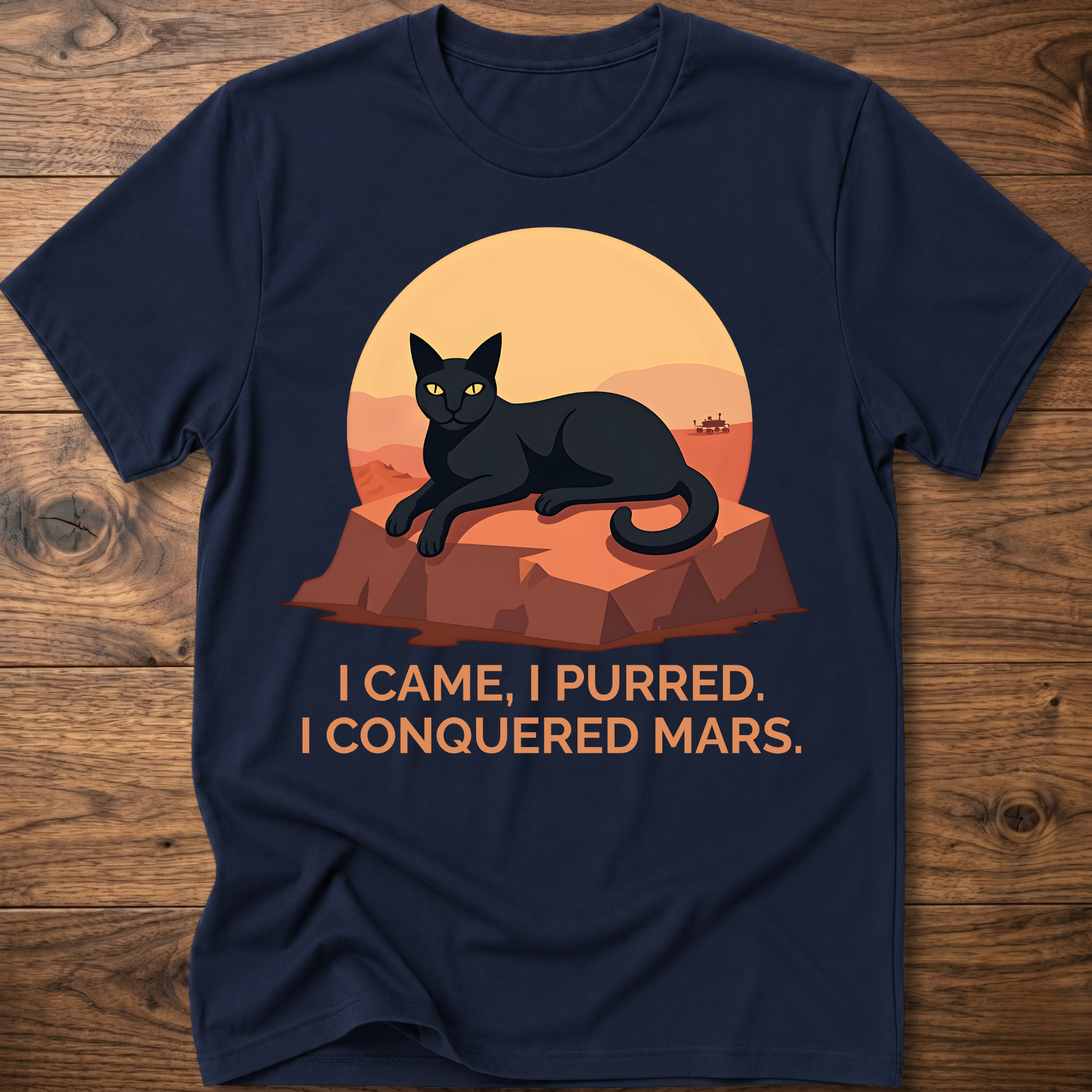 Conquered Cat T-shirt, navy; lounging cat graphic with orange text 'I CAME, I PURRED.'