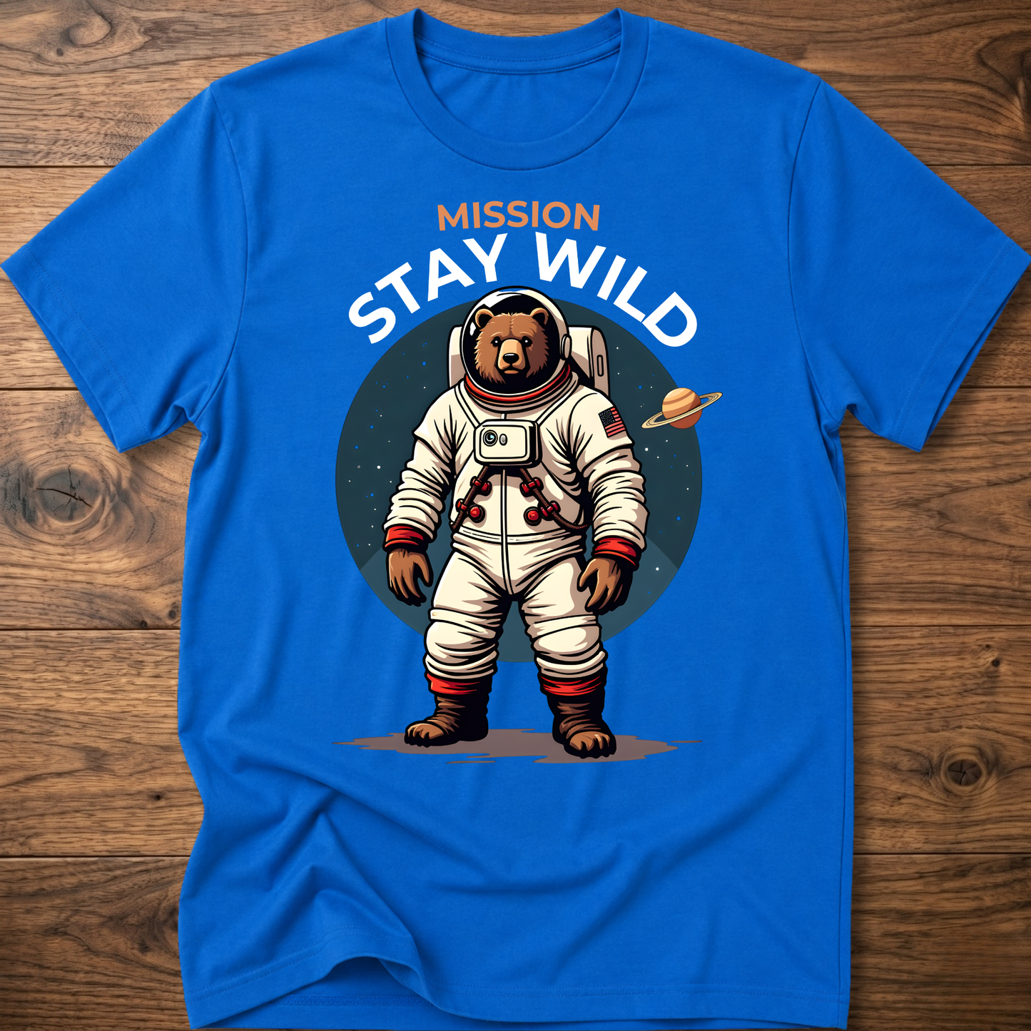 Royal blue crew-neck T-shirt with 'Mission Stay Wild' astronaut bear graphic