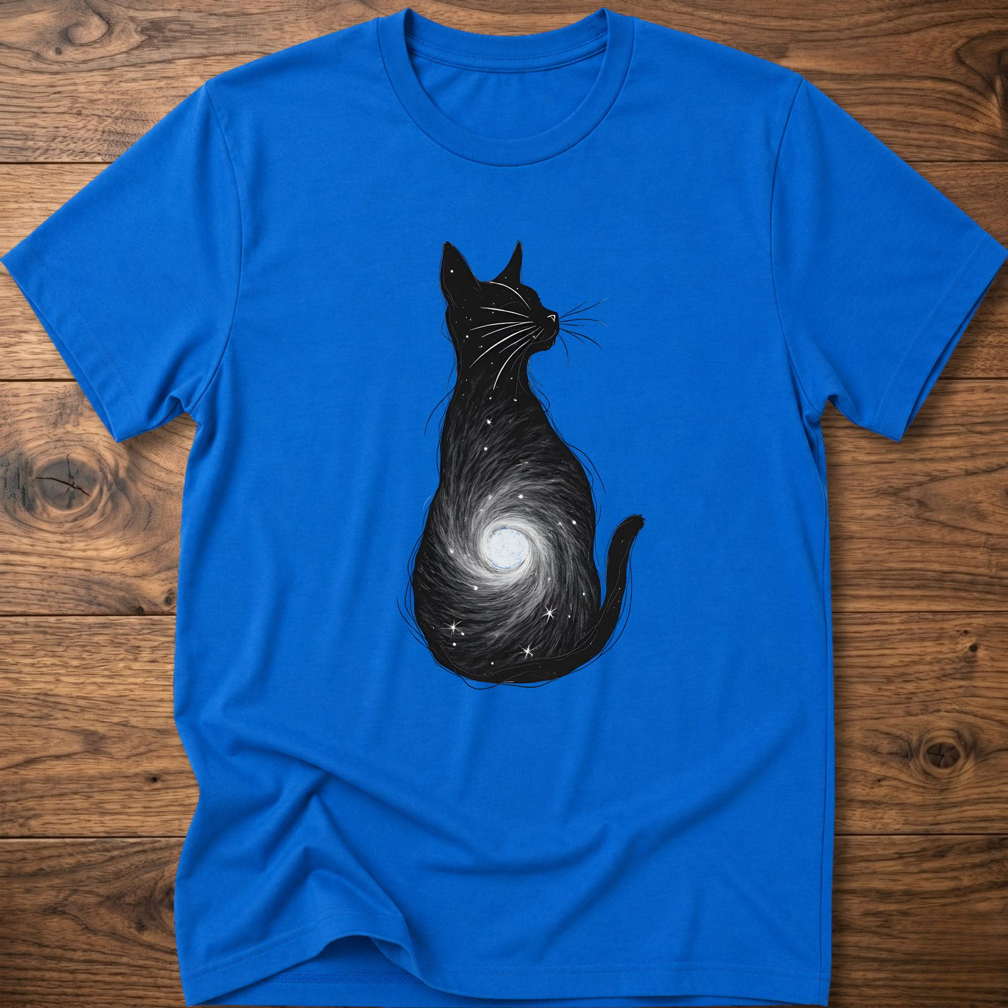 Royal blue cat graphic t-shirt with black cat silhouette and spiral galaxy swirl
