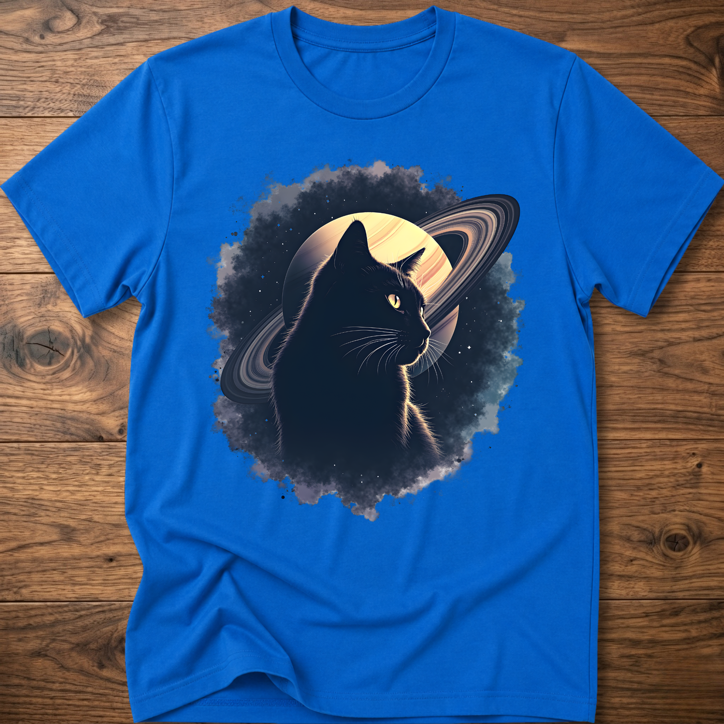 Royal blue cat graphic t-shirt with moon and swirl design, crew neck short sleeves