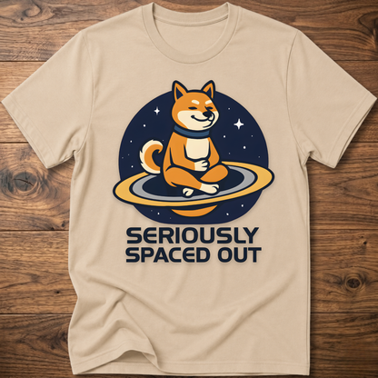 Beige dog astronaut graphic t-shirt with "SERIOUSLY SPACED OUT" text