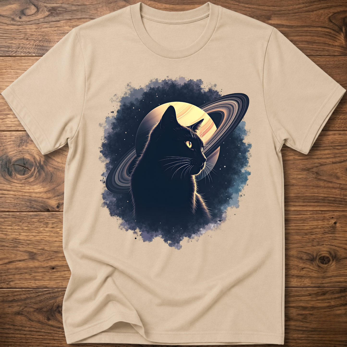 Beige cat graphic t-shirt with moon and swirl design, crew neck short sleeves
