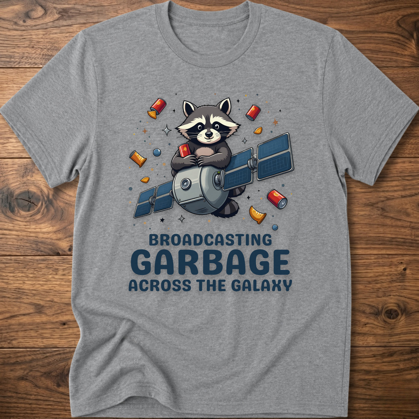 Heather gray crew-neck T-shirt with raccoon holding megaphone graphic and “Broadcasting Garbage” text.