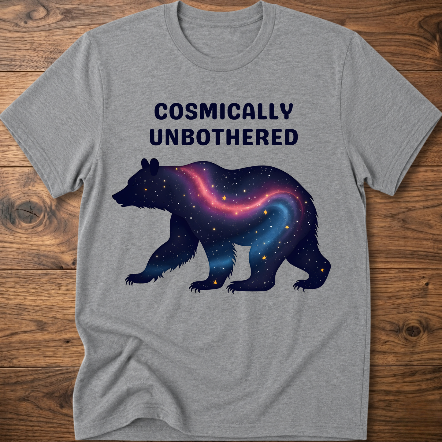 Heather gray graphic t-shirt with cosmic bear and COSMICALLY UNBOTHERED lettering