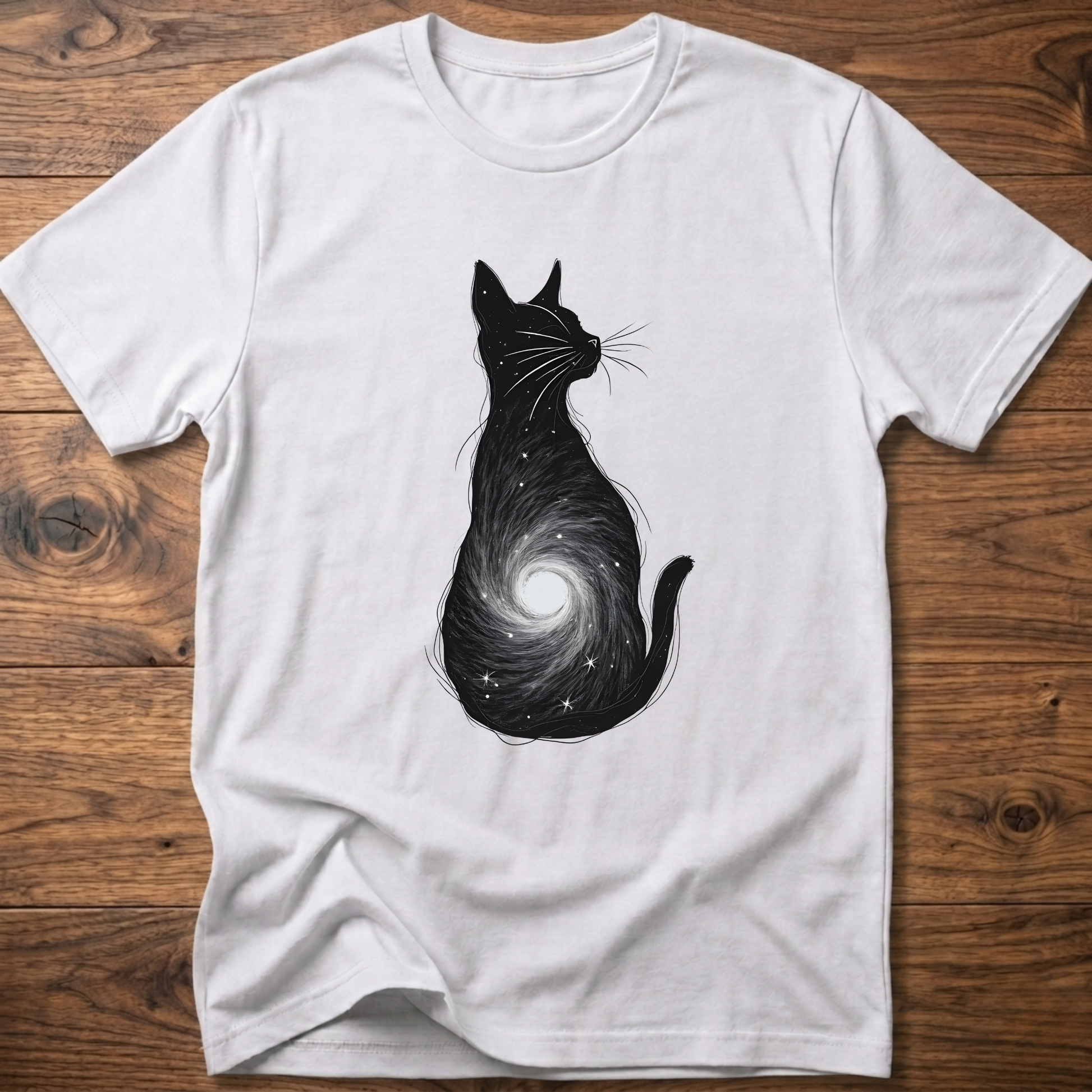 White cat graphic t-shirt with black cat silhouette and spiral galaxy swirl on front