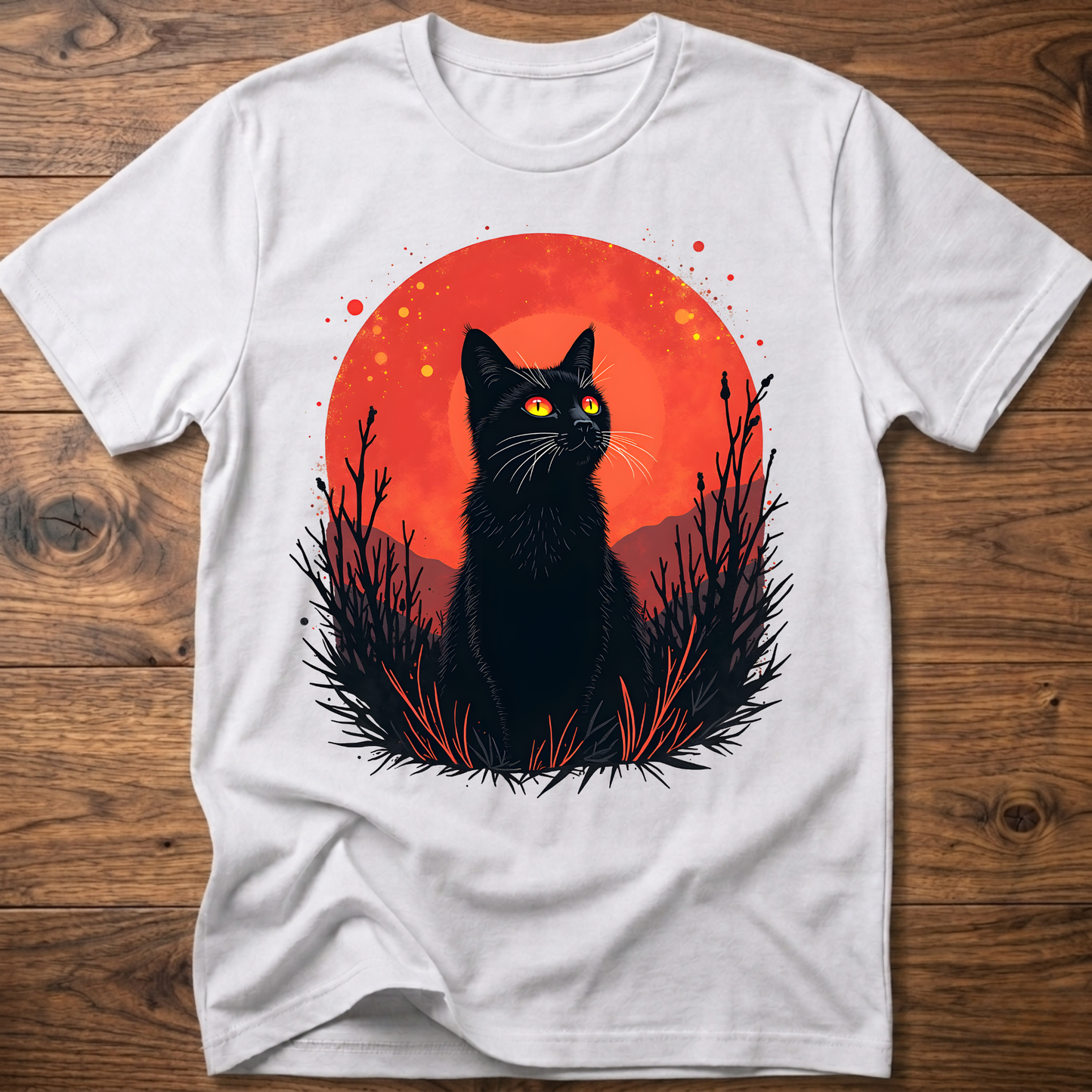 White T-shirt with black cat graphic in red-orange halo and night-plant silhouettes