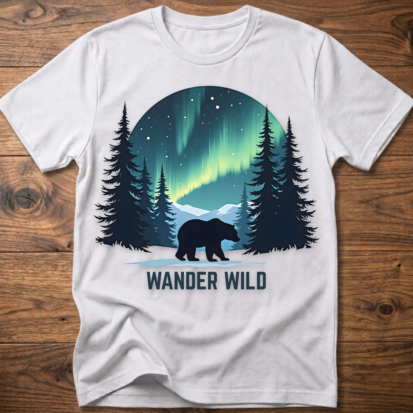 White crew-neck t-shirt with bear in forest graphic and 'Wander Wild' text