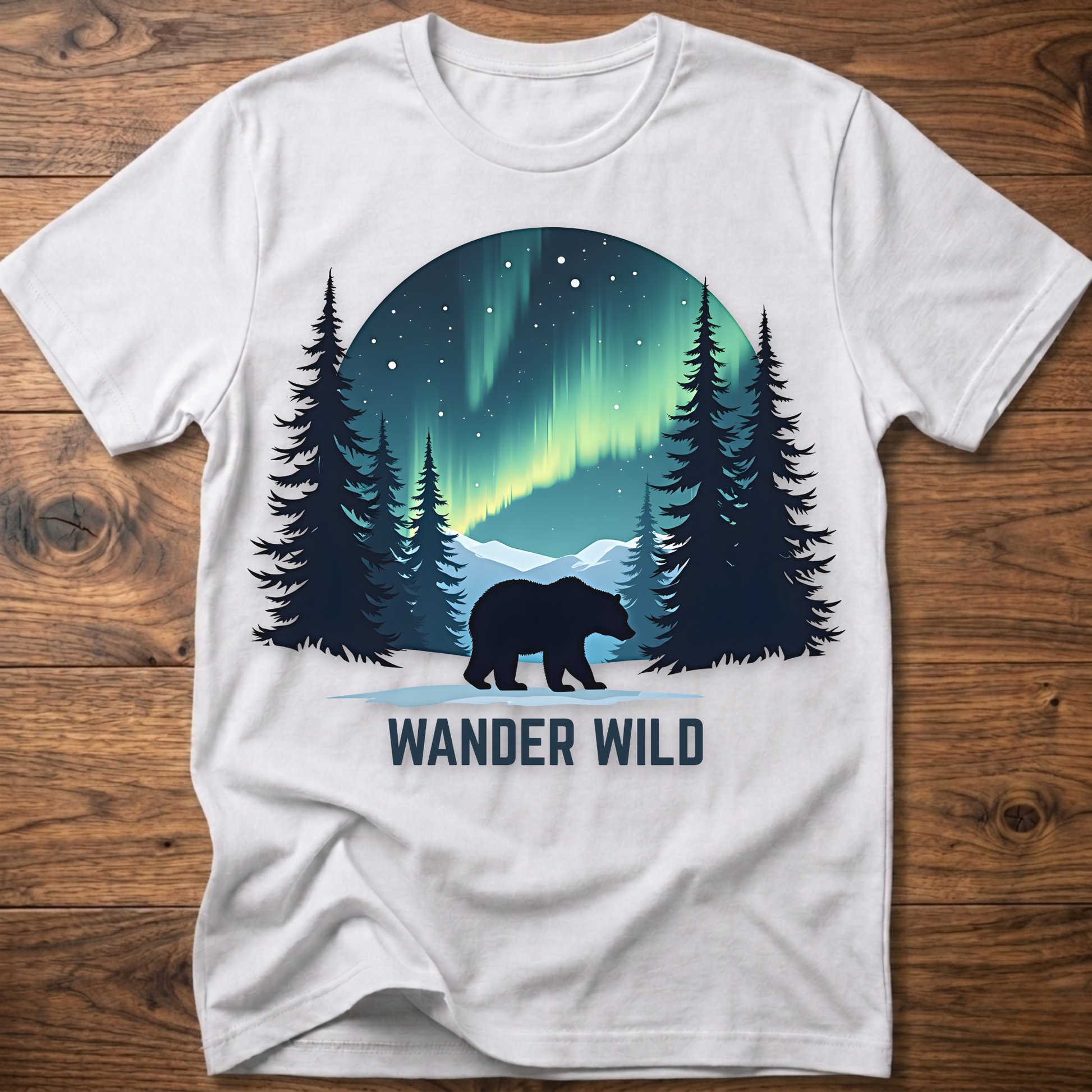 White crew-neck t-shirt with bear in forest graphic and 'Wander Wild' text